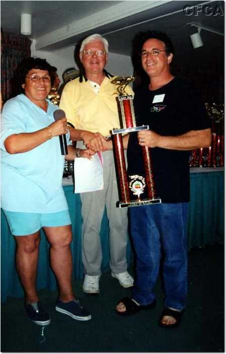 081.Kerry accepting his C5 trophy from Marie and Dave.jpg