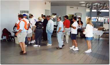 002.And the participants lined up for registration.JPG