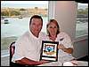 Cindy and Henry with winning plaque.jpg